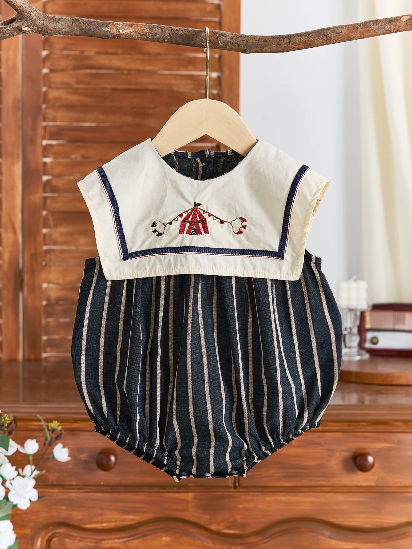 Summer baby girl's large lapel sleeveless triangular jumpsuit with striped body and navy collar